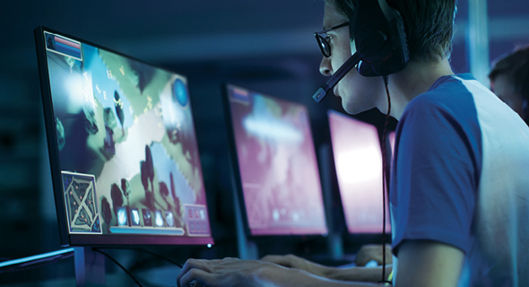 A gamer playing a videogame. Photo: Shutterstock A gamer playing a videogame. Photo: Shutterstock